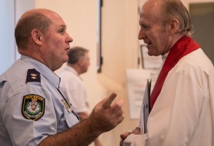 Supt Dean Smith of NSW Police chats to Fr Paul Roberts. Photos: Elizabeth McFarlane.