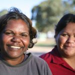 two smiling aboriginal women
