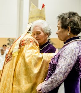 A special moment for Bishop Vincent and his Mum during the Mass. Photo: Alphonsus Fok. 