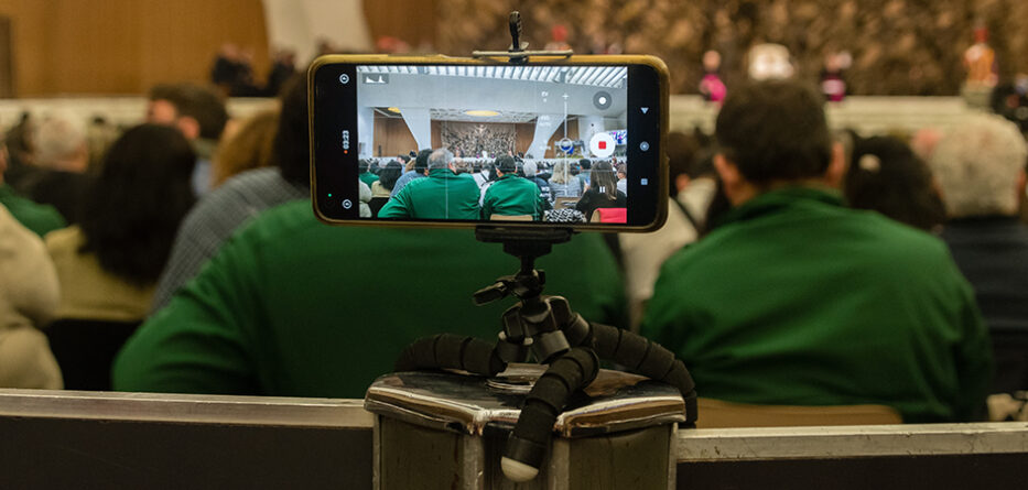 A smartphone records during a general Papal audience in the Vatican