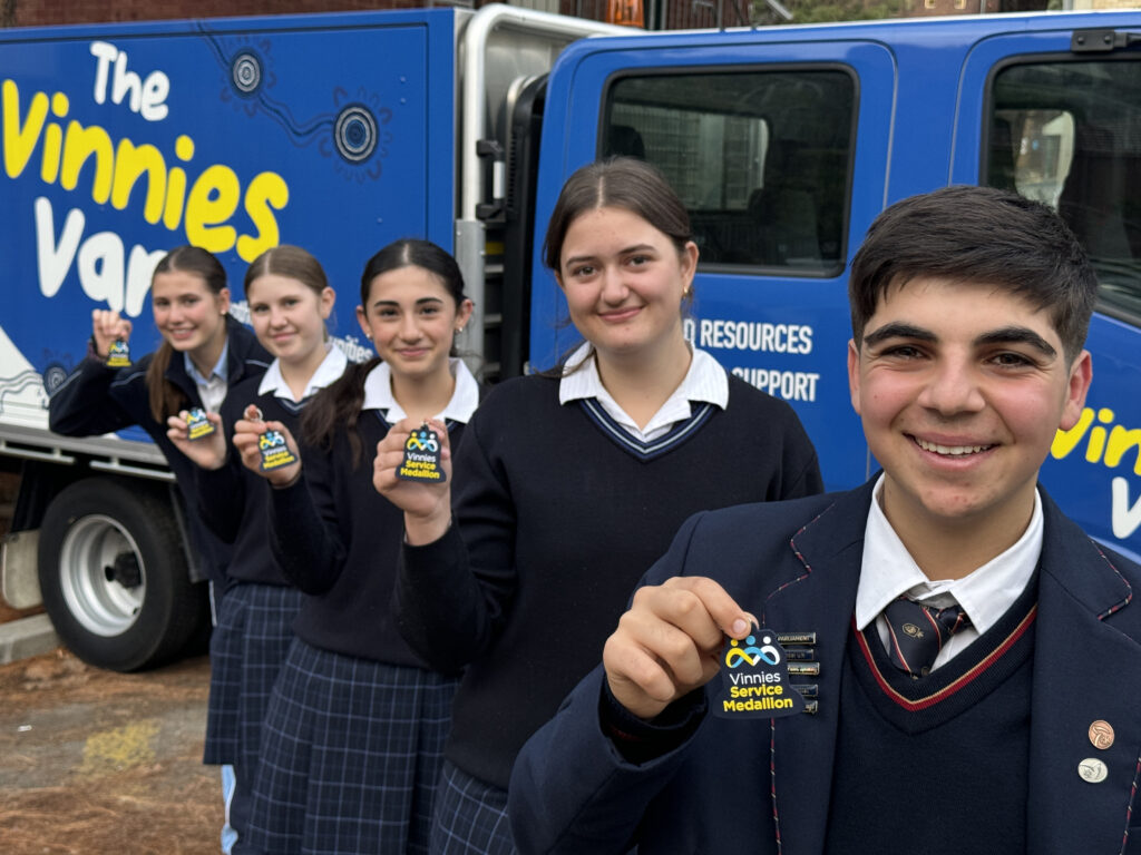 Students with new Vinnies Service Medallion. Image: supplied.