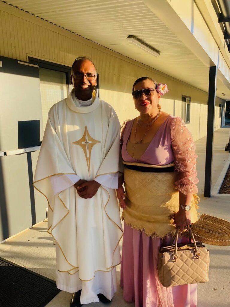 Fr Gayan Thamel EV PP, with a member of the Tongan community at St Luke's Parish Marsden Park. Image: supplied. 