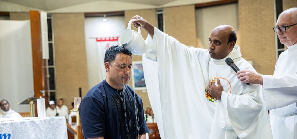 Home at last: new Catholics welcomed in powerful Easter Vigil in Penrith