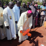 Local South Sudanese Catholics give thanks for the life of beloved priest, Monsignor Julius Ida Modesto